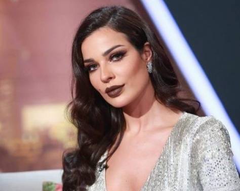 بالفيديو - نادين نسيب نجيم تكشف سراً عن حياتها الزوجية.. وهكذا غنت "جنوا نطوا"!!