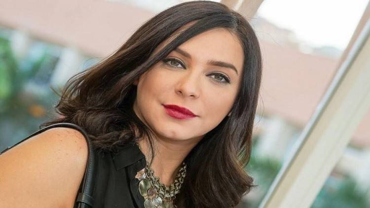 سلاف فواخرجي تنشر صورة ابنيها مع أسماء الأسد في احتفالات عيد الميلاد