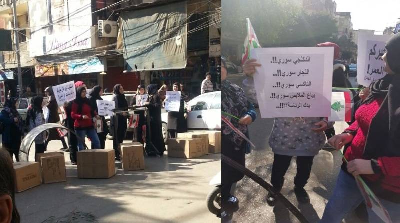 نسوة قطعن سوق الجمال في الشياح رفضا للعمالة السورية