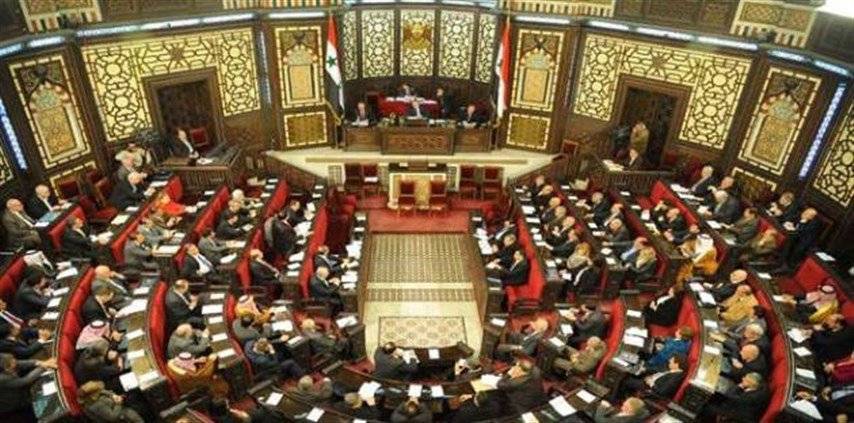 بالصور:  من أحرق مجلس الشعب السوري؟!