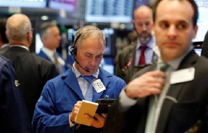 وول ستريت تغلق على ارتفاعات قياسية