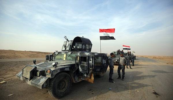 تحرير قرية الدامرجي في الموصل ورفع العلم العراقي فوقها