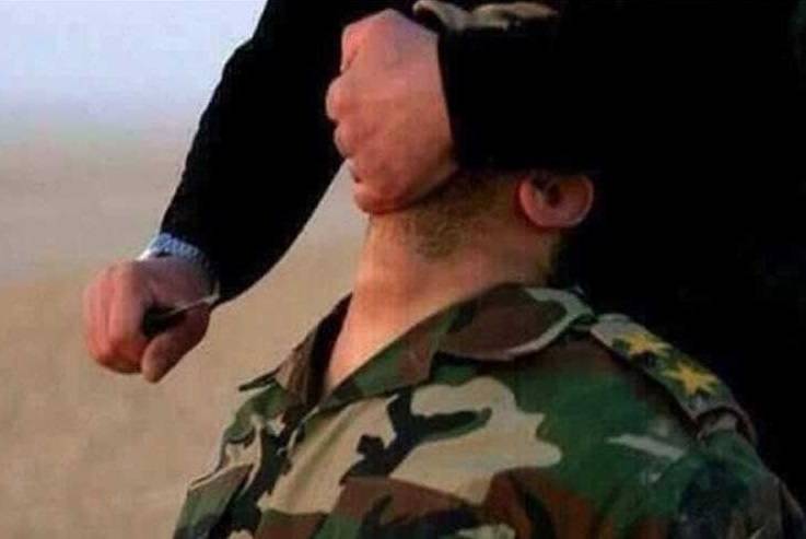 صورة داعشي ذبح أكثر من 400 جندي سوري ووقع بيد الجيش السوري