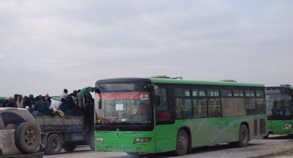 تفاصيل إجلاء أول مجموعة من المسلحين وأفراد عائلاتهم من الوعر بحمص