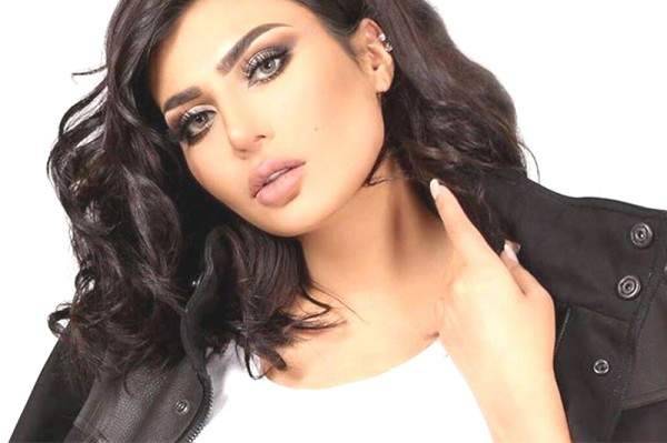 أمل العوضي تكشف حقيقة ارتباطها