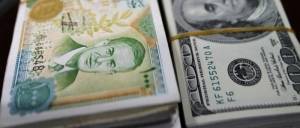 انخفاض قيمة الليرة السورية أمام العملات الأخرى وانعكاسه على السلع