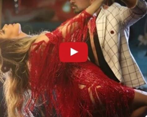 بالفيديو - نوال الزغبي بفستان أحمر جريء
