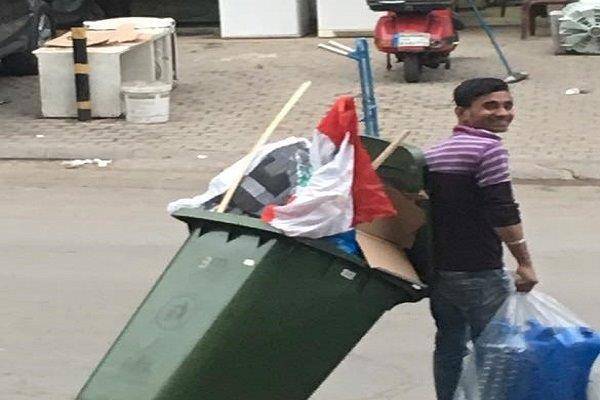 وضع العلم اللبناني في مستوعب النفايات... وتنقل في الضاحية