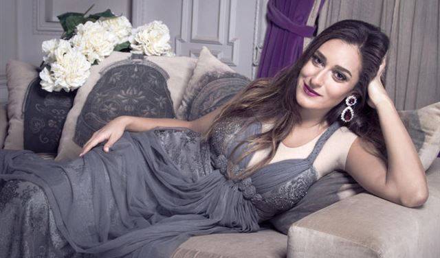أمينة خليل: هذه قصة الصورة التي جمعتني بعمرو يوسف