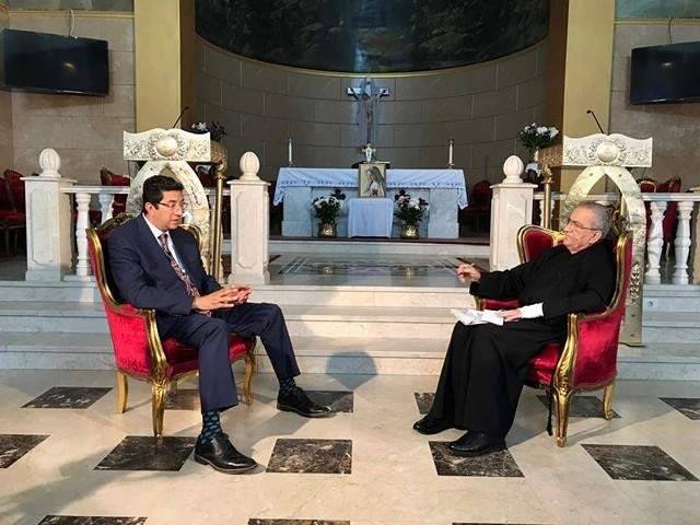 الأب مونس التقى في مصر المستشار أمير رمزي والسيدة منار ميخائيل