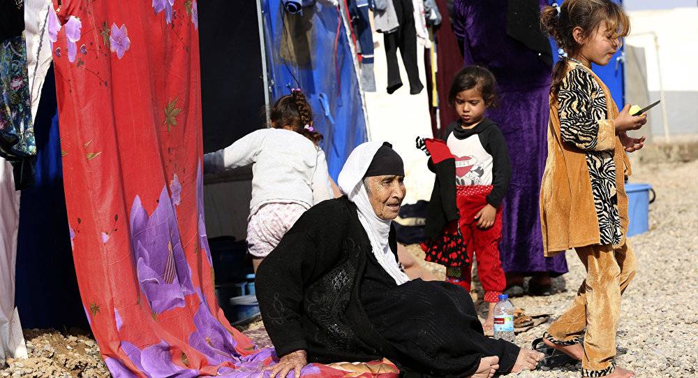 اعتقال أعضاء من المنظمة القطرية على خلفية تسمم 825 نازحا عراقيا