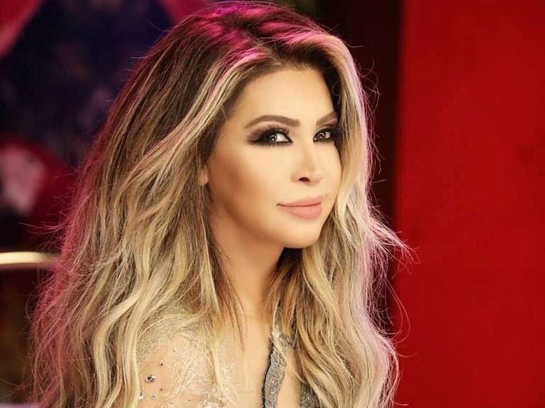 بالفيديو-  نوال الزغبي تخطف الأنظار بالأحمر!!