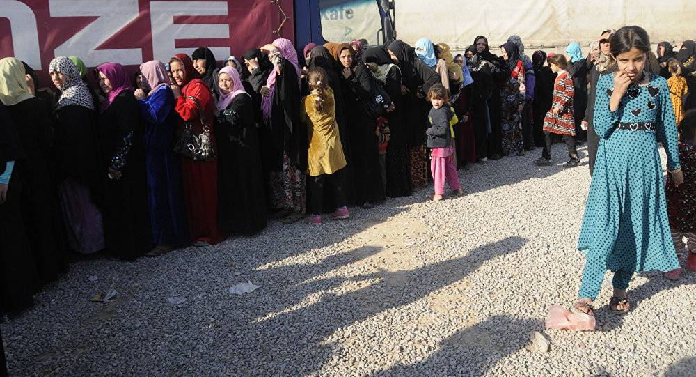بالصور...حقيقة فتاة حسناء اعتقلت على أنها روسية في الموصل