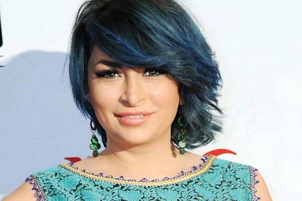 بالصورة - ديما بياعة تقوم بوشم ظهرها!