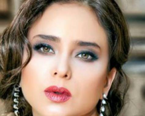 بالصورة - قبلة احمد الفيشاوي لنيللي كريم تشعل المواقع!