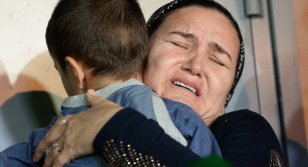 عودة طفلين شيشانيين إلى غروزني من العراق