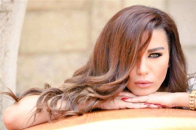 صورة تجمع نادين الراسي بوالدها.. فهل يشبهها؟