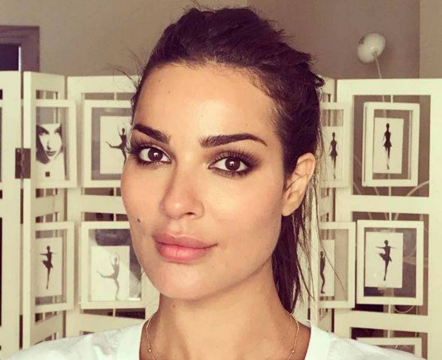 أول تعليق لنادين نجيم على كلام أمل بوشوشة عنها