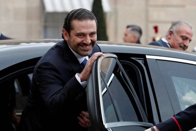 بالصور: هكذا غادر الحريري وعائلته الاليزيه.. ماكرون ودعهم بقبلة!