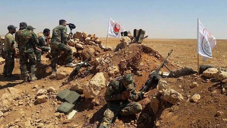 طهران تحث دمشق على شرعنة قوات الدفاع الوطني