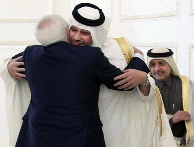 بالصور: عناق قطري إيراني حار!