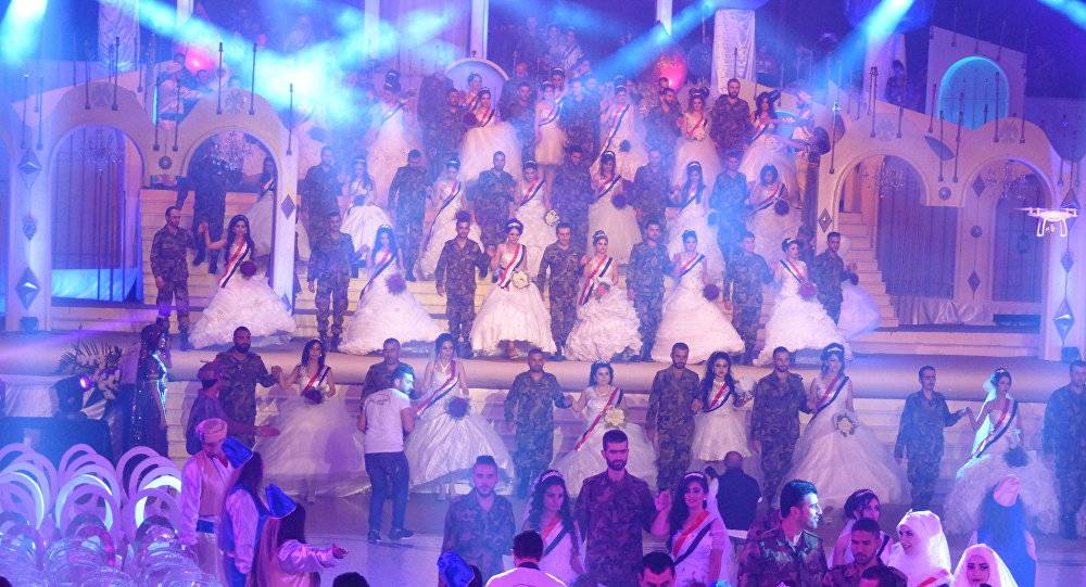 زفاف الموسم في سوريا.. 120 شاباً وشابة من الجيش من المعاناة الى الفرح