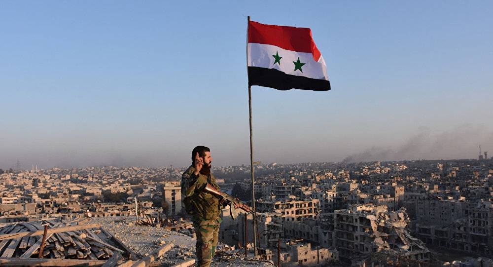 في حلب... العلم السوري أعلى من الأعلام الكردية فوق مؤسسات الدولة
