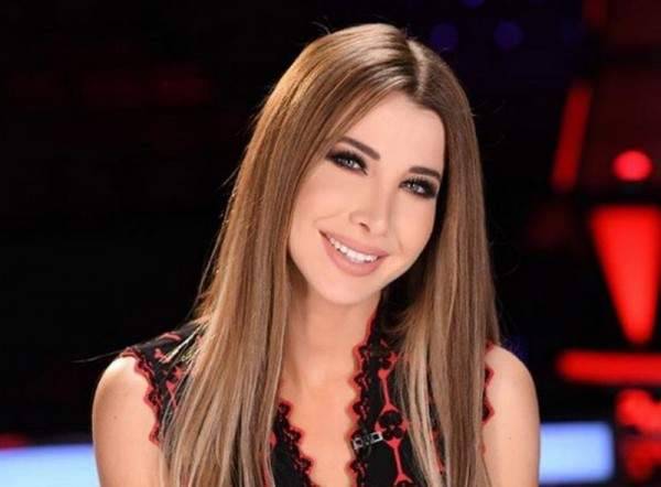 بالصور.. نانسي عجرم تخطف القلوب بالأحمر
