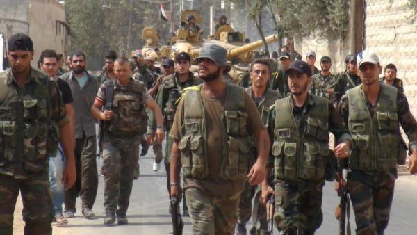 كم عدد الجنود السوريين الذين تمّ حشدهم لإنهاء التمرّد في الغوطة؟