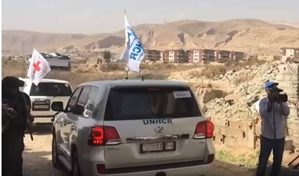 بالفيديو.. دخول قافلة مساعدات إنسانية إلى الغوطة الشرقية