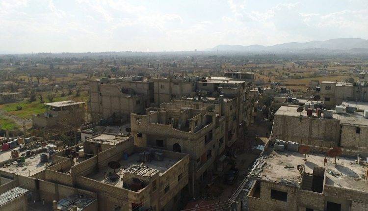 عقيد سوري: سكان الغوطة الشرقية سيعودون إلى "حضن الدولة" قريبا جدا