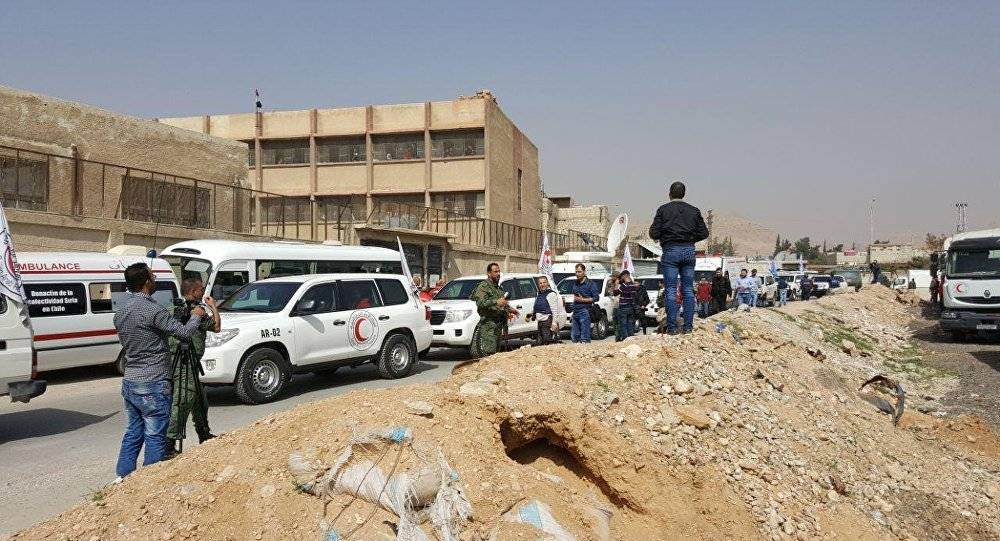 مركز المصالحة: تأجيل دخول قافلة المساعدات إلى دوما بسبب قصف المسلحين