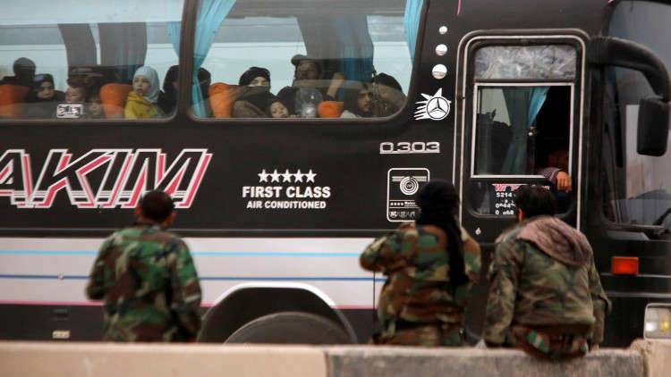 خروج أكبر موكب مسلحين ومدنيين من الغوطة الشرقية