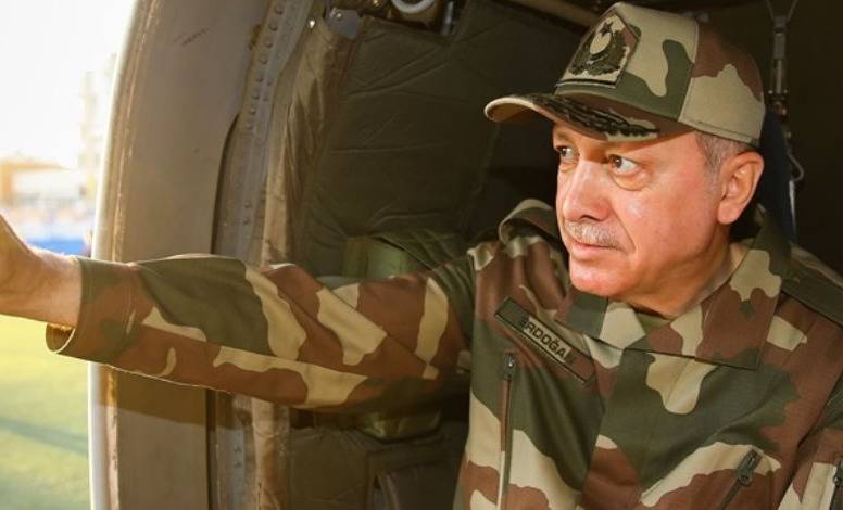 الكشف عن سر ارتداء أردوغان الزي العسكري
