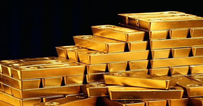 الذهب يتراجع 0.3 بالمئة بفعل ارتفاع الدولار لكن التوترات التجارية تدعمه