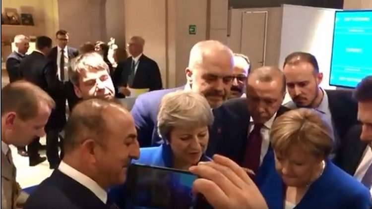 المونديال يلقي بظلاله على قمة الناتو.. فيديو غير مألوف لأردوغان وميركل وماي