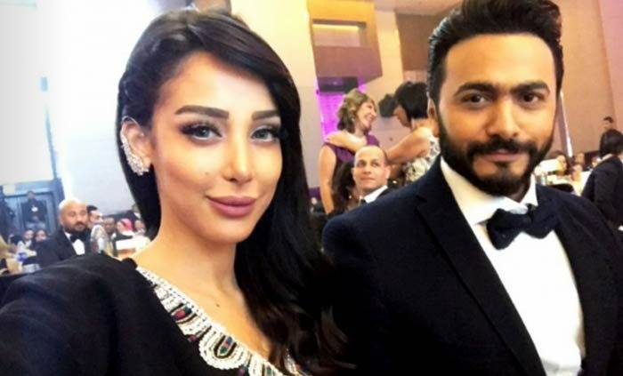 بالفيديو.. تامر حسني وزوجته يتخطيان أزمة الخيانة