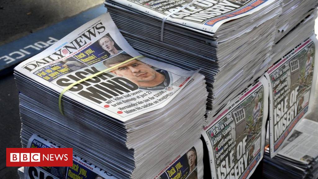 New York Daily News axes half of its staff