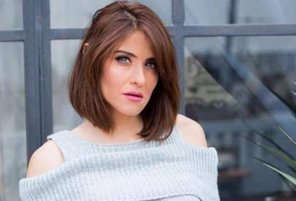 هيدي كرم تردّ على إتهامها بإستخدام عدسات لاصقة بصورة من الطفولة