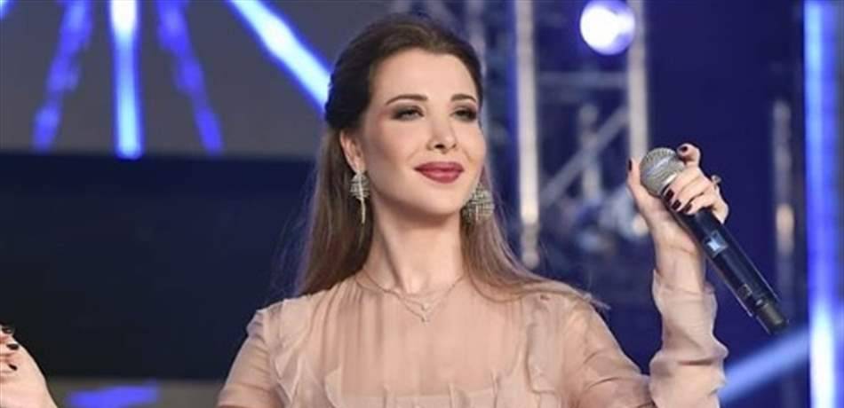 بالفيديو-مُعجب يطلب أمراً غريباً من نانسي عجرم خلال حفلها.. هكذا ردّت