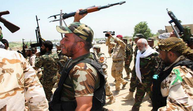 العبادي يتخذ قرارا مهما بشأن رواتب قوات الحشد الشعبي