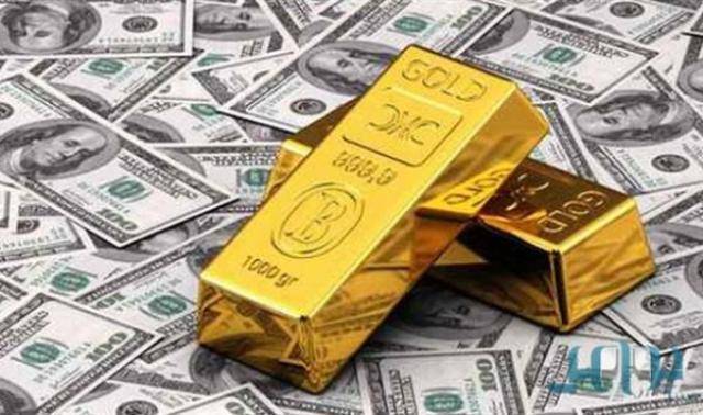 الذهب يستقر والدولار يتراجع عن ذروته