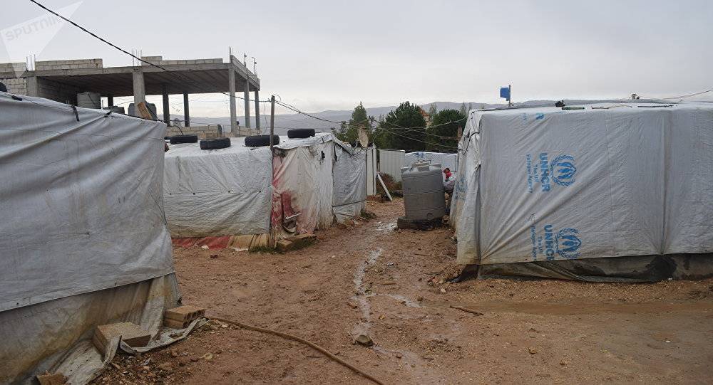 اللاجئون السوريون يستعدون لفصل الشتاء في ظل نقص المساعدات وارتفاع أسعار المحروقات