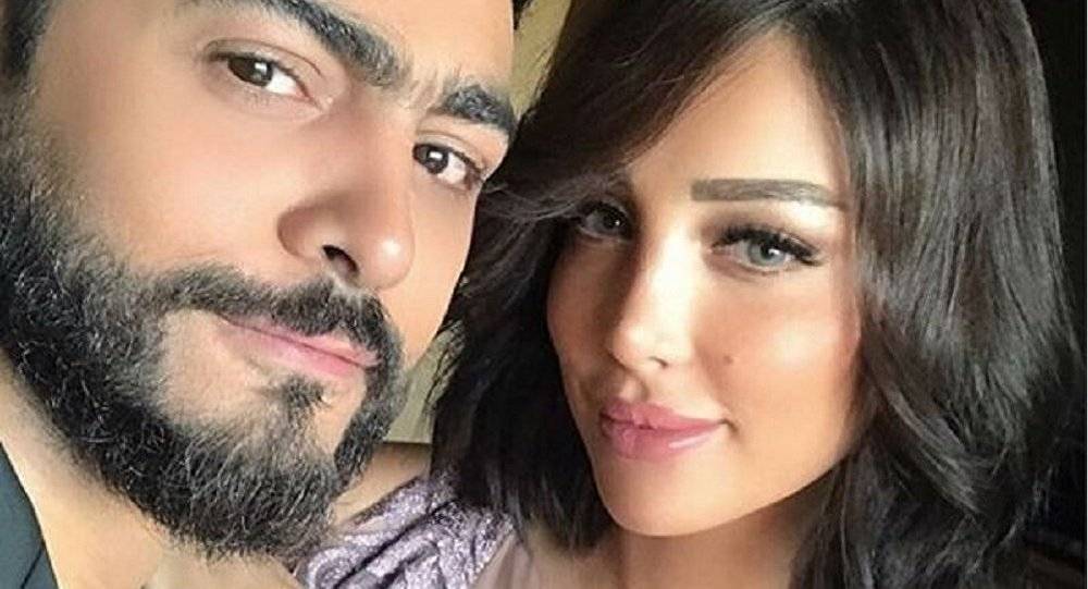 تامر حسني وزوجته يزفان خبرا سعيدا لمعجبيهما
