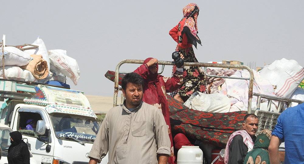 وصول مهجرين سوريين من مناطق المسلحين إلى ممر أبو الظهور