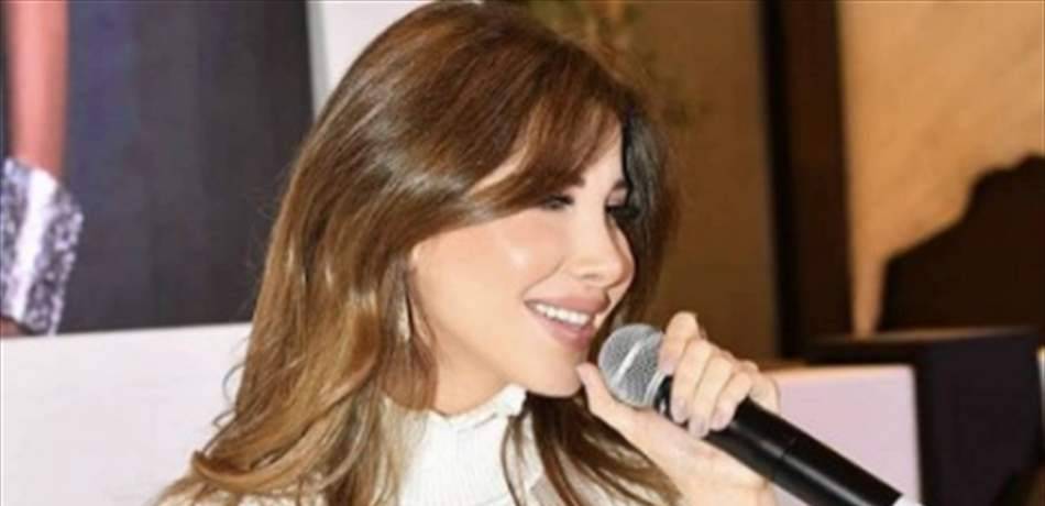 حمل نانسي عجرم بدا واضحًا.. وهذا سعر فستانها!