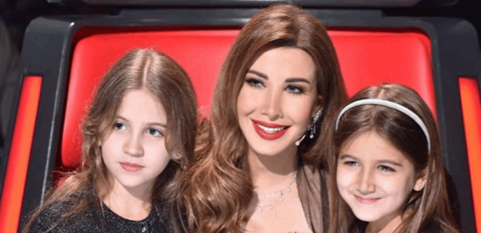 نانسي عجرم ببطن منتفخ تحتفل مع ابنتيها بعيد البربارة
