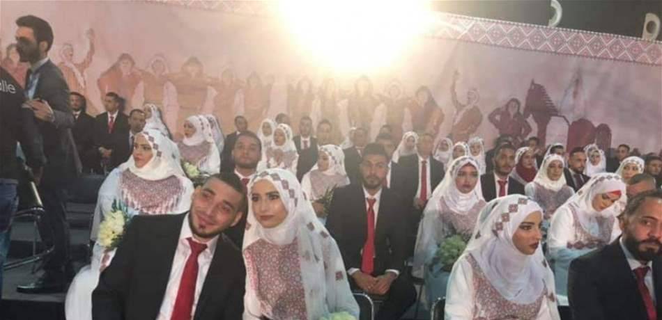 بالصور..392 عريساً وعروساً.. عرس جماعي فلسطيني في لبنان