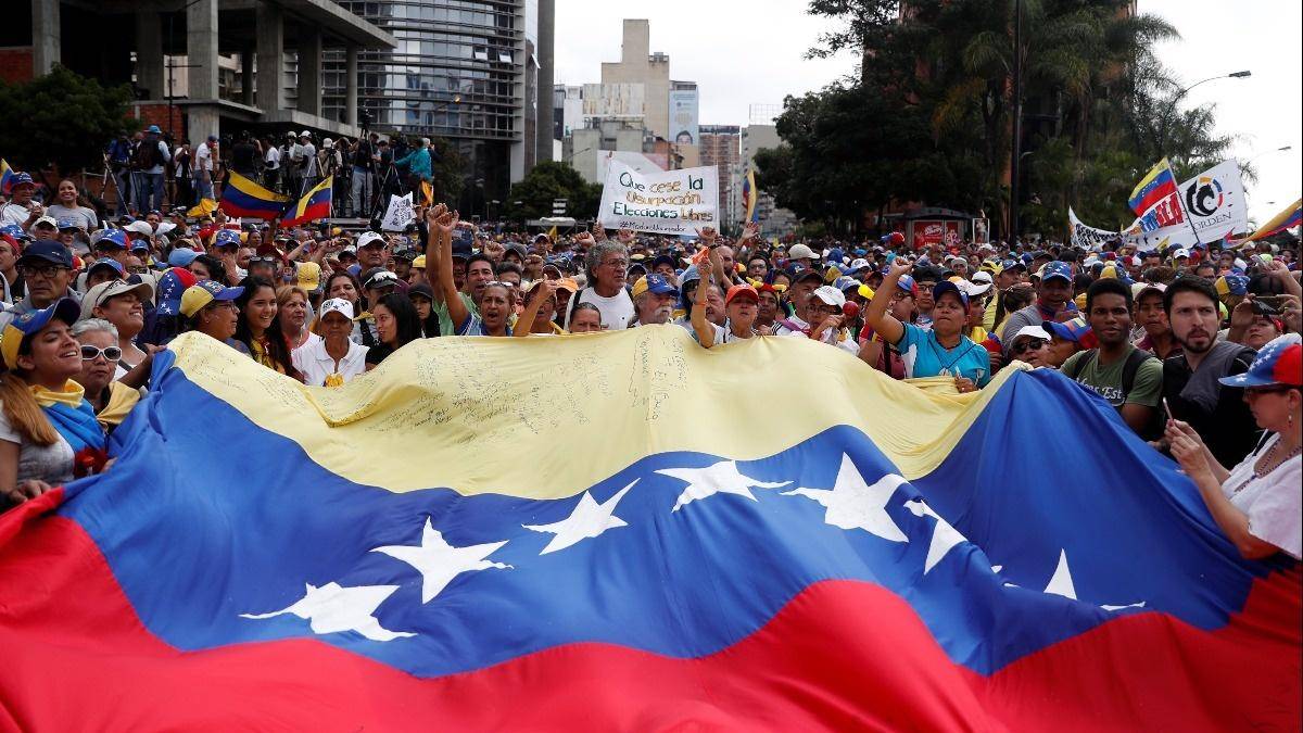 Trump backs Maduro rival amid massive protests