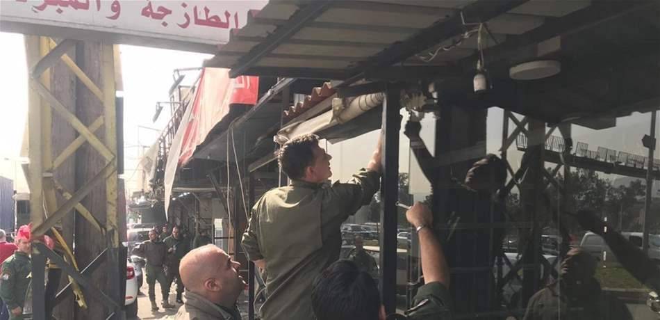 تفكيك وهدم المحلات المخالفة عند مدخل بيروت الشمالي (صور)